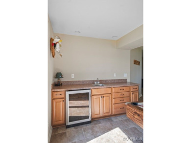 Welcome to your dream lakefront retreat! This stunning 5-bedroom on Lake Of The Woods Golf Course in Virginia - for sale on GolfHomes.com, golf home, golf lot