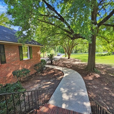 Live the lake and golf life at 119 Saluda Drive, located in the on Santee-Cooper Country Club in South Carolina - for sale on GolfHomes.com, golf home, golf lot