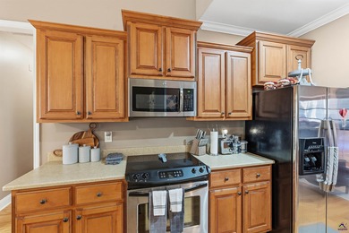 Beautifully maintained and move-in ready, this home is located on Canongate At Healy Point Country Club in Georgia - for sale on GolfHomes.com, golf home, golf lot