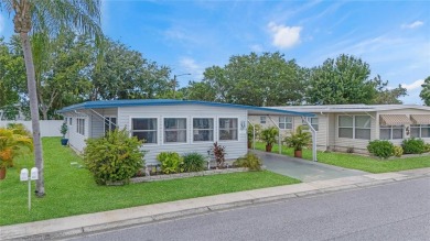 Welcome Home to this beautifully updated house in a desirable on Fairway Village Golf Course in Florida - for sale on GolfHomes.com, golf home, golf lot