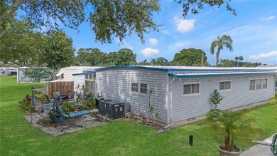 Welcome Home to this beautifully updated house in a desirable on Fairway Village Golf Course in Florida - for sale on GolfHomes.com, golf home, golf lot