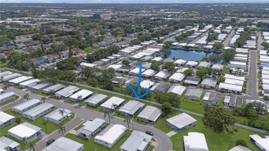 Welcome Home to this beautifully updated house in a desirable on Fairway Village Golf Course in Florida - for sale on GolfHomes.com, golf home, golf lot