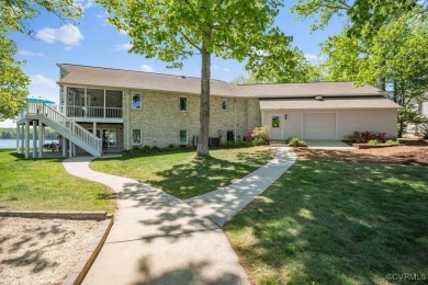 Welcome to your dream lakefront retreat! This stunning 5-bedroom on Lake Of The Woods Golf Course in Virginia - for sale on GolfHomes.com, golf home, golf lot