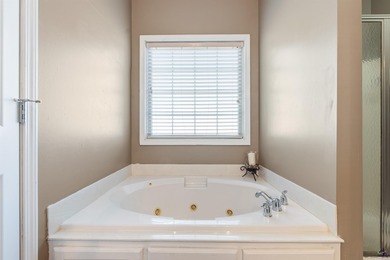 Beautifully maintained and move-in ready, this home is located on Canongate At Healy Point Country Club in Georgia - for sale on GolfHomes.com, golf home, golf lot