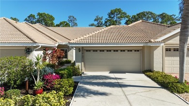 *Honey, we're home!* You're going to love this stunning attached on Herons Glen Golf and Country Club in Florida - for sale on GolfHomes.com, golf home, golf lot