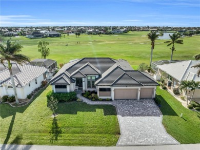 This exceptional residence, situated on the 13th hole of Twin on Twin Isles Country Club in Florida - for sale on GolfHomes.com, golf home, golf lot