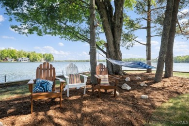 Welcome to your dream lakefront retreat! This stunning 5-bedroom on Lake Of The Woods Golf Course in Virginia - for sale on GolfHomes.com, golf home, golf lot