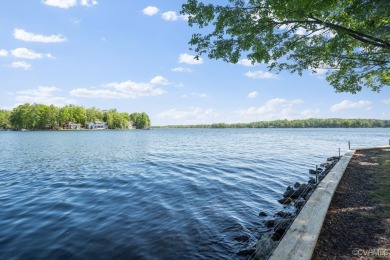 Welcome to your dream lakefront retreat! This stunning 5-bedroom on Lake Of The Woods Golf Course in Virginia - for sale on GolfHomes.com, golf home, golf lot