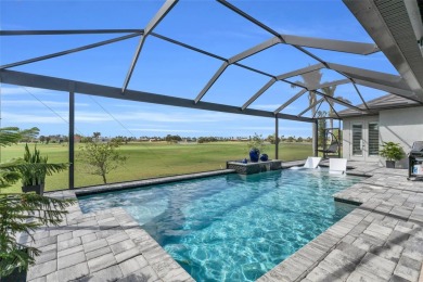 This exceptional residence, situated on the 13th hole of Twin on Twin Isles Country Club in Florida - for sale on GolfHomes.com, golf home, golf lot