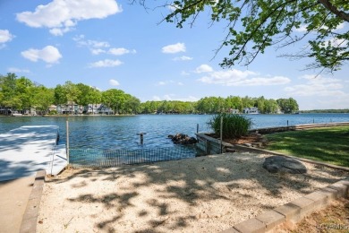 Welcome to your dream lakefront retreat! This stunning 5-bedroom on Lake Of The Woods Golf Course in Virginia - for sale on GolfHomes.com, golf home, golf lot