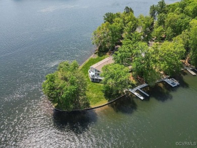 Welcome to your dream lakefront retreat! This stunning 5-bedroom on Lake Of The Woods Golf Course in Virginia - for sale on GolfHomes.com, golf home, golf lot
