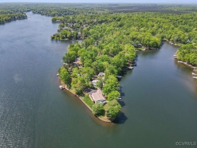 Welcome to your dream lakefront retreat! This stunning 5-bedroom on Lake Of The Woods Golf Course in Virginia - for sale on GolfHomes.com, golf home, golf lot