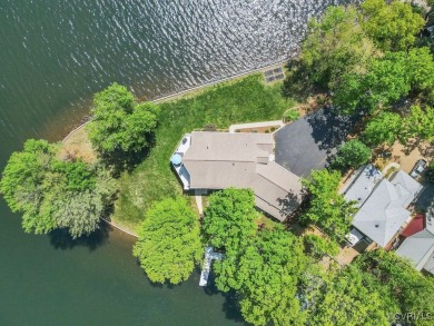 Welcome to your dream lakefront retreat! This stunning 5-bedroom on Lake Of The Woods Golf Course in Virginia - for sale on GolfHomes.com, golf home, golf lot