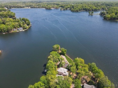 Welcome to your dream lakefront retreat! This stunning 5-bedroom on Lake Of The Woods Golf Course in Virginia - for sale on GolfHomes.com, golf home, golf lot