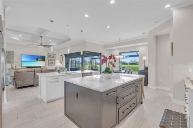 This exceptional residence, situated on the 13th hole of Twin on Twin Isles Country Club in Florida - for sale on GolfHomes.com, golf home, golf lot