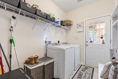 Beautifully maintained and move-in ready, this home is located on Canongate At Healy Point Country Club in Georgia - for sale on GolfHomes.com, golf home, golf lot