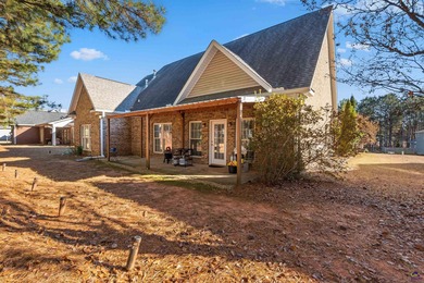 Beautifully maintained and move-in ready, this home is located on Canongate At Healy Point Country Club in Georgia - for sale on GolfHomes.com, golf home, golf lot