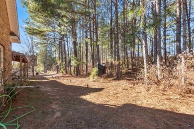 Beautifully maintained and move-in ready, this home is located on Canongate At Healy Point Country Club in Georgia - for sale on GolfHomes.com, golf home, golf lot