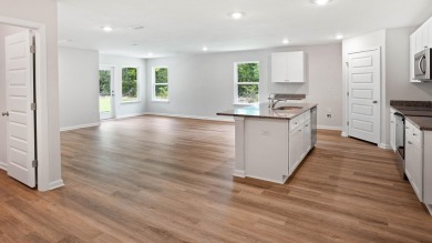 Welcome to the Freeport Plan, a new home floor plan at Sunny on Sunny Hills Golf and Country Club in Florida - for sale on GolfHomes.com, golf home, golf lot