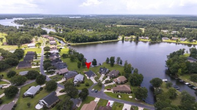 Immaculate LAKE ARBU WATERFRONT HOME on a cul-de-sac in gated on Players Course At Wyboo Plantation in South Carolina - for sale on GolfHomes.com, golf home, golf lot