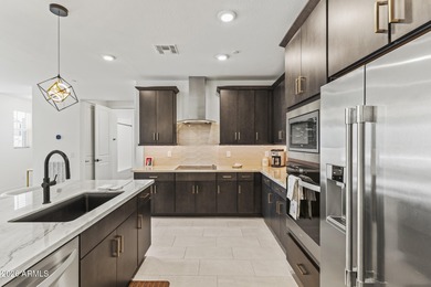 Fabulous first-floor resort style living abounds as this Villa on Sterling Grove Golf & Country Club in Arizona - for sale on GolfHomes.com, golf home, golf lot