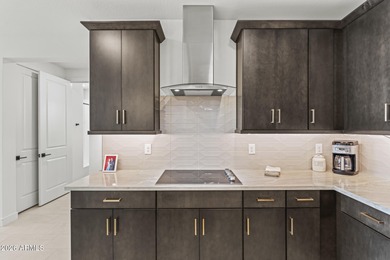 Fabulous first-floor resort style living abounds as this Villa on Sterling Grove Golf & Country Club in Arizona - for sale on GolfHomes.com, golf home, golf lot