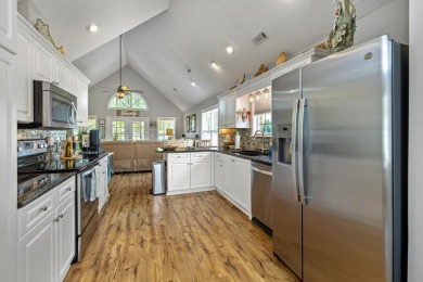Immaculate LAKE ARBU WATERFRONT HOME on a cul-de-sac in gated on Players Course At Wyboo Plantation in South Carolina - for sale on GolfHomes.com, golf home, golf lot