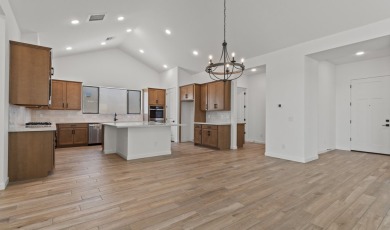 Expansive great room and dining area with optional vaulted on Verrado Golf Club - Victory in Arizona - for sale on GolfHomes.com, golf home, golf lot