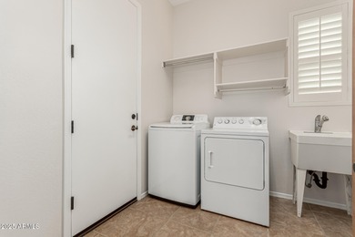 Discover this popular and meticulously maintained Civitas model on Trilogy Golf Club At Vistancia in Arizona - for sale on GolfHomes.com, golf home, golf lot