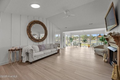 Nestled in a serene, nature-filled environment, this beautifully on Harbour Point Golf Club in North Carolina - for sale on GolfHomes.com, golf home, golf lot