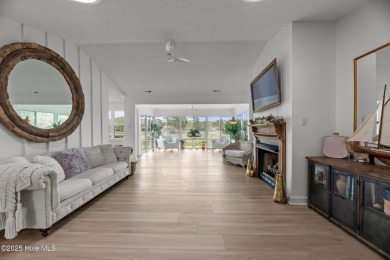 Nestled in a serene, nature-filled environment, this beautifully on Harbour Point Golf Club in North Carolina - for sale on GolfHomes.com, golf home, golf lot