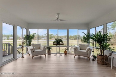 Nestled in a serene, nature-filled environment, this beautifully on Harbour Point Golf Club in North Carolina - for sale on GolfHomes.com, golf home, golf lot