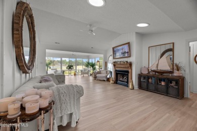 Nestled in a serene, nature-filled environment, this beautifully on Harbour Point Golf Club in North Carolina - for sale on GolfHomes.com, golf home, golf lot