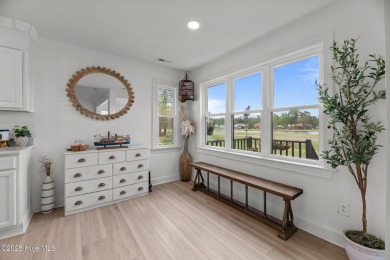 Nestled in a serene, nature-filled environment, this beautifully on Harbour Point Golf Club in North Carolina - for sale on GolfHomes.com, golf home, golf lot