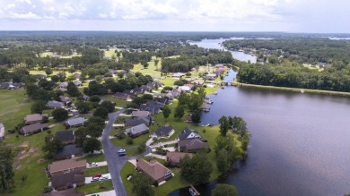 Immaculate LAKE ARBU WATERFRONT HOME on a cul-de-sac in gated on Players Course At Wyboo Plantation in South Carolina - for sale on GolfHomes.com, golf home, golf lot