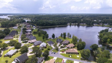 Immaculate LAKE ARBU WATERFRONT HOME on a cul-de-sac in gated on Players Course At Wyboo Plantation in South Carolina - for sale on GolfHomes.com, golf home, golf lot