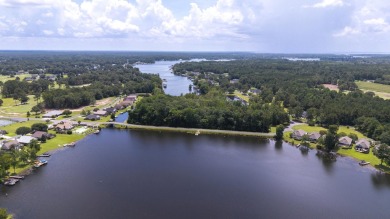 Immaculate LAKE ARBU WATERFRONT HOME on a cul-de-sac in gated on Players Course At Wyboo Plantation in South Carolina - for sale on GolfHomes.com, golf home, golf lot