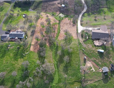 Discover the perfect blend of privacy, nature, and lake-area on The Club at Copper Valley Golf Course in California - for sale on GolfHomes.com, golf home, golf lot