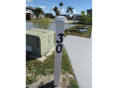 Price Improvement! LOCATION! LOCATION! Vacant lot on a 2-way on Kelly Greens Golf and Country Club in Florida - for sale on GolfHomes.com, golf home, golf lot