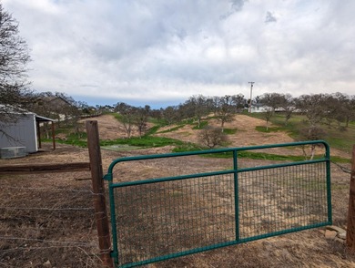 Discover the perfect blend of privacy, nature, and lake-area on The Club at Copper Valley Golf Course in California - for sale on GolfHomes.com, golf home, golf lot