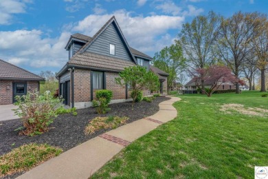 This expansive residence in Sedalia, MO, offers generous living on Sedalia Country Club in Missouri - for sale on GolfHomes.com, golf home, golf lot