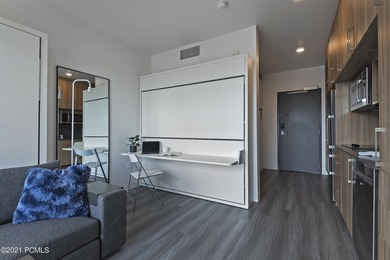 Top-floor residence at Canyon Haus (formerly YotelPad Park City) on Canyons Golf Course in Utah - for sale on GolfHomes.com, golf home, golf lot