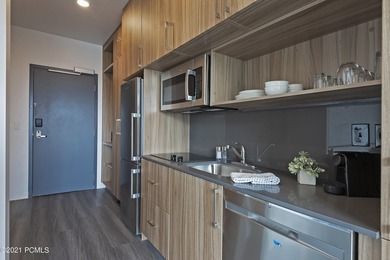 Top-floor residence at Canyon Haus (formerly YotelPad Park City) on Canyons Golf Course in Utah - for sale on GolfHomes.com, golf home, golf lot