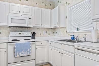 Welcome to this stunning 2-bedroom, 2-bathroom golf villa in the on Barefoot Resort and Golf Club  in South Carolina - for sale on GolfHomes.com, golf home, golf lot