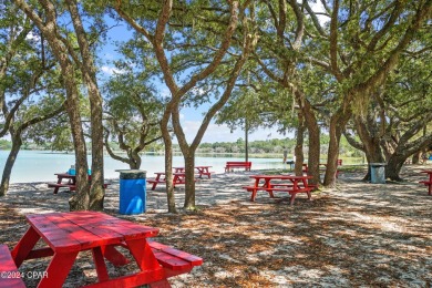 This over-sized corner lot is located in Unit 1 of the peaceful on Sunny Hills Golf and Country Club in Florida - for sale on GolfHomes.com, golf home, golf lot