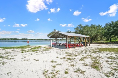 This over-sized corner lot is located in Unit 1 of the peaceful on Sunny Hills Golf and Country Club in Florida - for sale on GolfHomes.com, golf home, golf lot