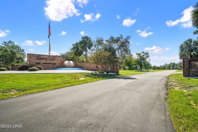 This over-sized corner lot is located in Unit 1 of the peaceful on Sunny Hills Golf and Country Club in Florida - for sale on GolfHomes.com, golf home, golf lot
