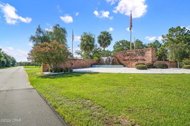 This over-sized corner lot is located in Unit 1 of the peaceful on Sunny Hills Golf and Country Club in Florida - for sale on GolfHomes.com, golf home, golf lot