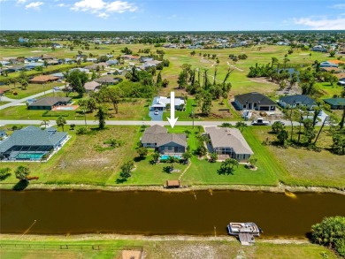 SELLER PRICED TO SELL! CANALFRONT POOL HOME LOCATED IN THE on Rotonda Golf and Country Club The Palms Course in Florida - for sale on GolfHomes.com, golf home, golf lot