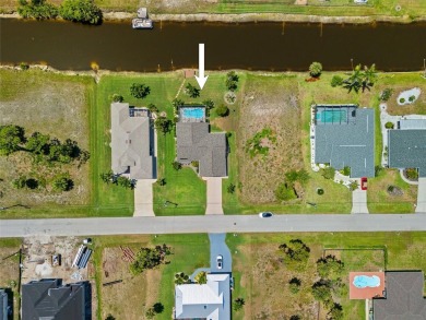 SELLER PRICED TO SELL! CANALFRONT POOL HOME LOCATED IN THE on Rotonda Golf and Country Club The Palms Course in Florida - for sale on GolfHomes.com, golf home, golf lot